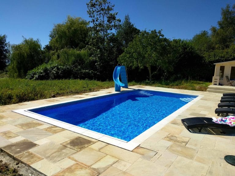 Outdoor Lined Swimming Pool With Slide and Summerhouse